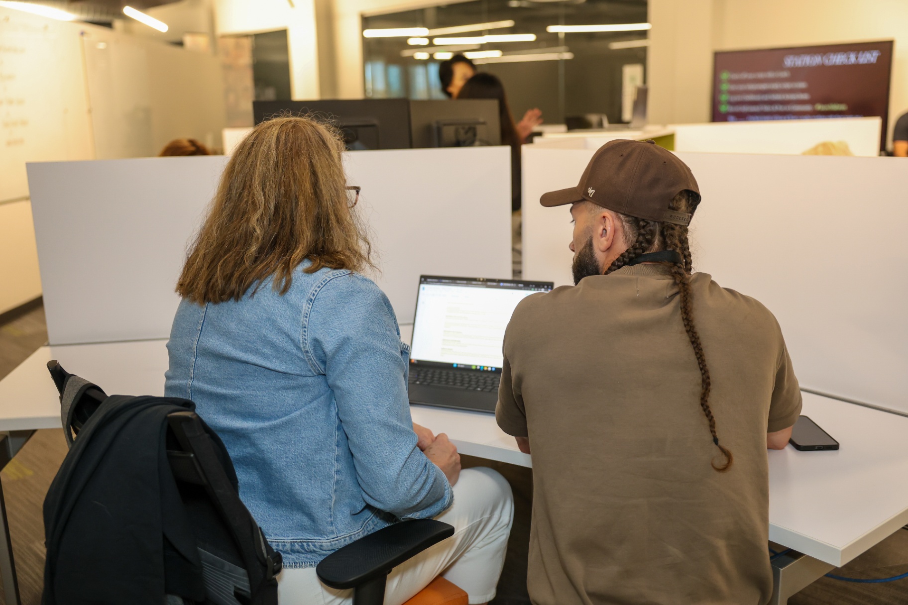 Mario Silot working closely with a participant